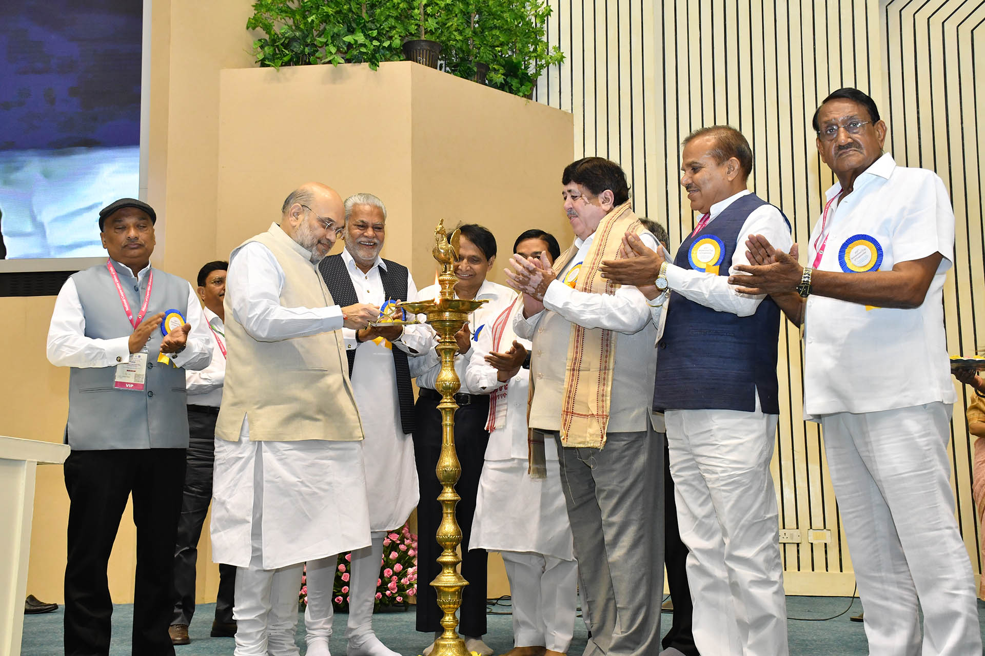 Shri Amit Shah Lighting the Lamp on the occasion of 100th International day of Cooperatives