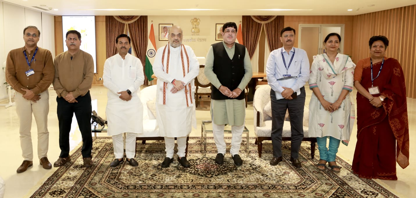 Team NCUI under the leadership of our President, Sh. Dileep Sanghani giving a presentation about Role & Activities of NCUI in front of Sh. Amit Shah, Hon'ble Union Minister of Home & Cooperation.